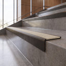 Antique Bronze anti-slip stair nosing with chalk CarbiGrip insert fitted to concrete steps