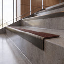 Antique Bronze anti-slip stair nosing with chestnut CarbiGrip insert fitted to concrete steps