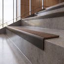 Antique Bronze anti-slip stair nosing with hazelnut CarbiGrip insert fitted to concrete steps