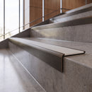 Antique Bronze anti-slip stair nosing with snow white ridged PVC insert fitted to concrete steps