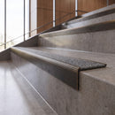 Antique Bronze anti-slip stair nosing with speckled pebble CarbiGrip insert fitted to concrete steps