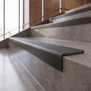 Antique Bronze anti-slip stair nosing with storm grey ridged PVC insert fitted to concrete steps