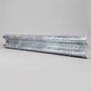 Single corrugated W-profile galvanised steel Armco beam laid on a plain grey background showing its bolt slots