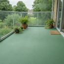 Mid Green TerraceShield anti-slip balcony paint applied to a balcony floor, a garden-view balcony surrounded by potted plants