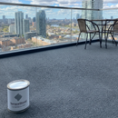 TerraceShield anti-slip balcony paint tin on a freshly painted balcony floor, minor detail shot