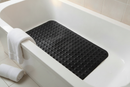 Black non-slip suction bath mat with 200 suction cups laid inside a white bathtub