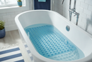 Clear blue tinted non-slip suction bath mat in a coastal-style bathroom bathtub