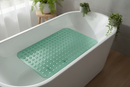 Clear green tinted non-slip suction bath mat in a spa-style bathroom bathtub