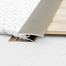 Close-up of Z-profile aluminium carpet threshold gripping carpet edge at doorway - screw fix