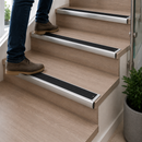 Anti-slip bullnose stair nosing with black PVC insert, semi-rounded profile