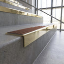 Solid brass stair nosing, 59.5mm tread with a 30mm square front, in Polished Brass finish with Rustic Castellated insert, fitted to a staircase
