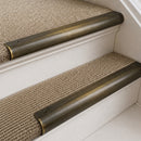 Antique Brass finish with Polished Brass insert - 63.5mm solid brass bullnose stair nosing fitted to a carpeted step