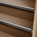 Antique Bronze finish with Polar Grey Castellated insert - 63.5mm solid brass bullnose stair nosing fitted to a carpeted step