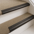 Antique Bronze finish with Polished Brass insert - 63.5mm solid brass bullnose stair nosing fitted to a carpeted step