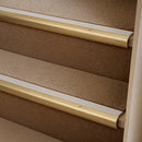 Satin Brass finish with Polar Grey Castellated insert - 63.5mm solid brass bullnose stair nosing fitted to a carpeted step