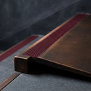BN71SLR solid brass stair nosing in Antique Bronze finish with Claret Castellated insert, fitted to a step edge
