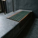 BN71SLR solid brass stair nosing in Antique Bronze finish with Spruce Castellated insert, fitted to a step edge