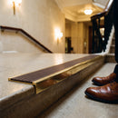 Solid brass stair nosing, 59.5mm tread with a 30mm square front, in Polished Brass finish, fitted to a staircase