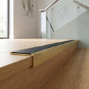Solid brass stair nosing, 59.5mm tread with a 30mm square front, in Satin Brass finish, fitted to a staircase