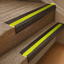 Solid brass 63.5mm bullnose stair nosing fitted to a step - Antique Bronze with Yellow Castellated insert