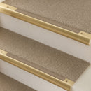 Satin Brass finish with Fawn Castellated insert - 63.5mm solid brass bullnose stair nosing fitted to a carpeted step