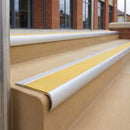 Mill Finish 70 x 37mm bullnose stair nosing, Brimstone Exterior Grip insert, on outdoor entrance steps
