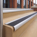 Mill Finish 70 x 37mm bullnose stair nosing, Coal Exterior Grip insert, on outdoor entrance steps