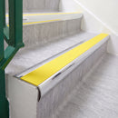 Mirrorflect Silver 70 x 37mm bullnose stair nosing, Solar High Grip insert, on vinyl school stairs