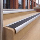 Satin Silver 70 x 37mm bullnose stair nosing, Coal Exterior Grip insert, on outdoor entrance steps