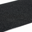 Close-up of anti-slip stair tread surface showing coarse grit texture for maximum grip