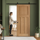 Premium Unfinished Oak 1930's DX 4 Panel Sliding Door with Black Top Mounted System for Vintage Charm