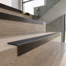 Antique Bronze carborundum insert stair nosing with graphite CarbiGrip insert fitted to travertine steps