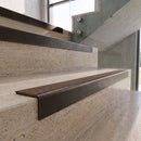 Antique Bronze carborundum insert stair nosing with hazelnut CarbiGrip insert fitted to travertine steps