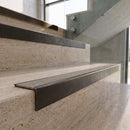 Antique Bronze carborundum insert stair nosing with Portland stone CarbiGrip insert fitted to travertine steps