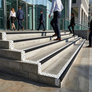 Professional building steps with metal stair nosing trim and safety strips for slip resistance