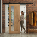 Premium Unfinished Oak Internal Sliding Door with Clear Offset Glass Panel and Black Top Mounted System for Modern Interiors