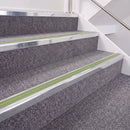 Bright Polished double insert chevron stair nosing, 40mm riser with Apple Green inserts, fitted on carpeted stairs