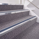 Bright Polished double insert chevron stair nosing, 40mm riser with Blue inserts, fitted on carpeted stairs