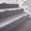 Bright Polished double insert chevron stair nosing, 40mm riser with Polar Grey inserts, fitted on carpeted stairs