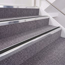 Bright Polished double insert chevron stair nosing, 40mm riser with Premium Black inserts, fitted on carpeted stairs