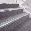 Bright Polished double insert chevron stair nosing, 40mm riser with Sage Green inserts, fitted on carpeted stairs
