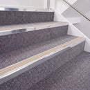 Bright Polished double insert chevron stair nosing, 40mm riser with Sahara inserts, fitted on carpeted stairs