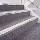 Bright Polished double insert chevron stair nosing, 40mm riser with White inserts, fitted on carpeted stairs