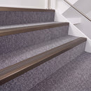 Dark Bronze double insert chevron stair nosing, 40mm riser with Brown inserts, fitted on carpeted stairs