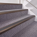 Dark Bronze double insert chevron stair nosing, 40mm riser with Dark Grey inserts, fitted on carpeted stairs