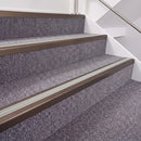 Dark Bronze double insert chevron stair nosing, 40mm riser with Oyster inserts, fitted on carpeted stairs