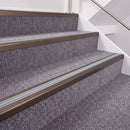 Dark Bronze double insert chevron stair nosing, 40mm riser with Polar Grey inserts, fitted on carpeted stairs