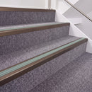 Dark Bronze double insert chevron stair nosing, 40mm riser with Sage Green inserts, fitted on carpeted stairs