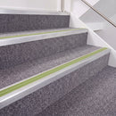Mill Finish double insert chevron stair nosing, 40mm riser with Apple Green inserts, fitted on carpeted stairs