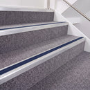 Mill Finish double insert chevron stair nosing, 40mm riser with Dark Blue inserts, fitted on carpeted stairs